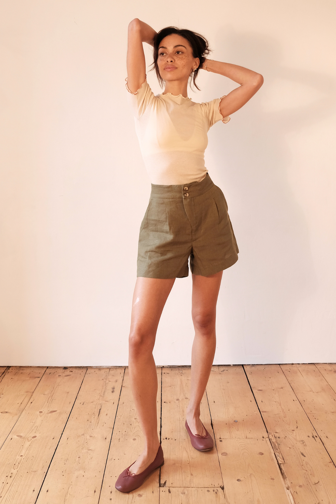green pure linen tailored shorts