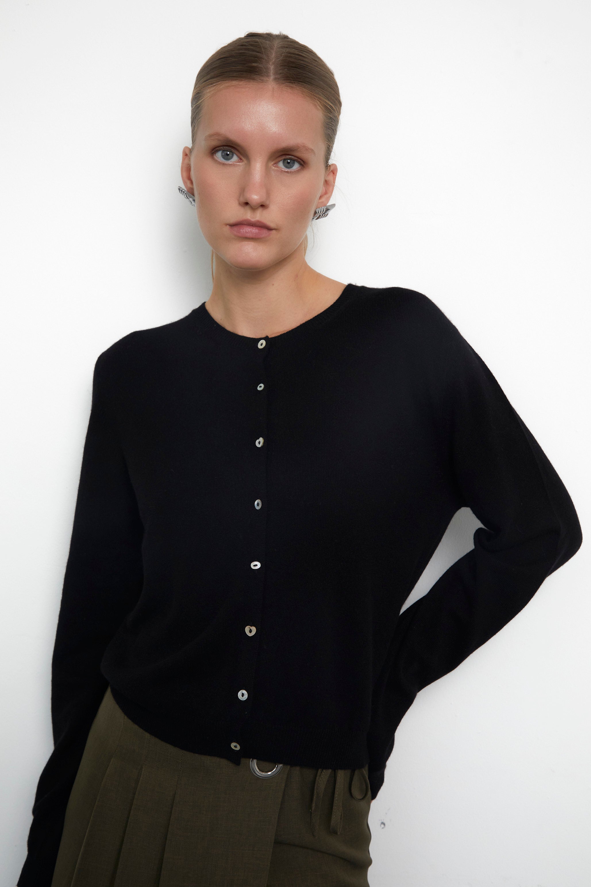 Black cashmere cardigan with button front and crew neckline