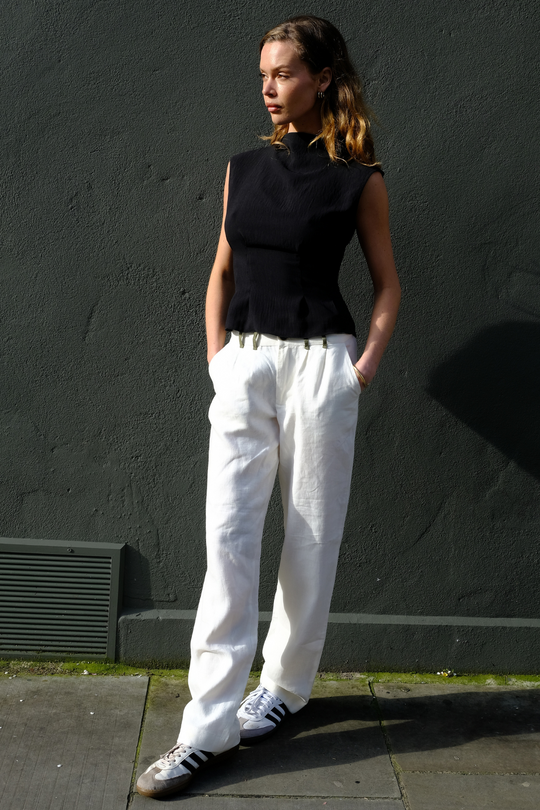 pure linen trousers in white, worn in London