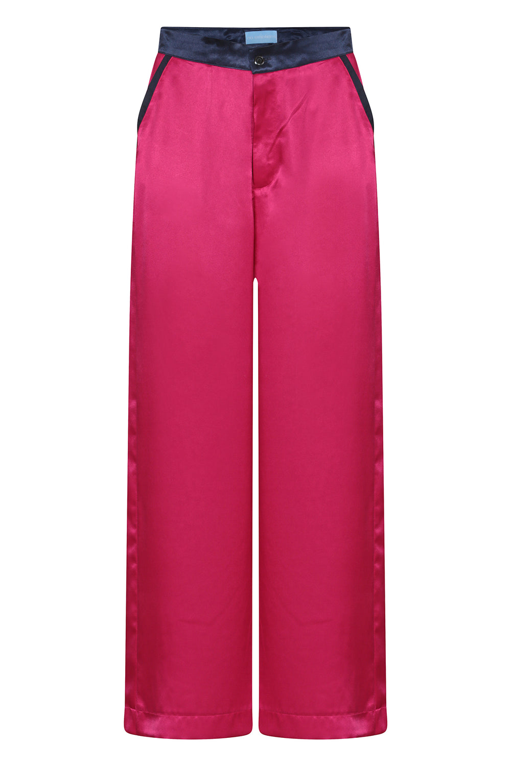 dark pink wide-leg silk trousers with navy trims, worn in London