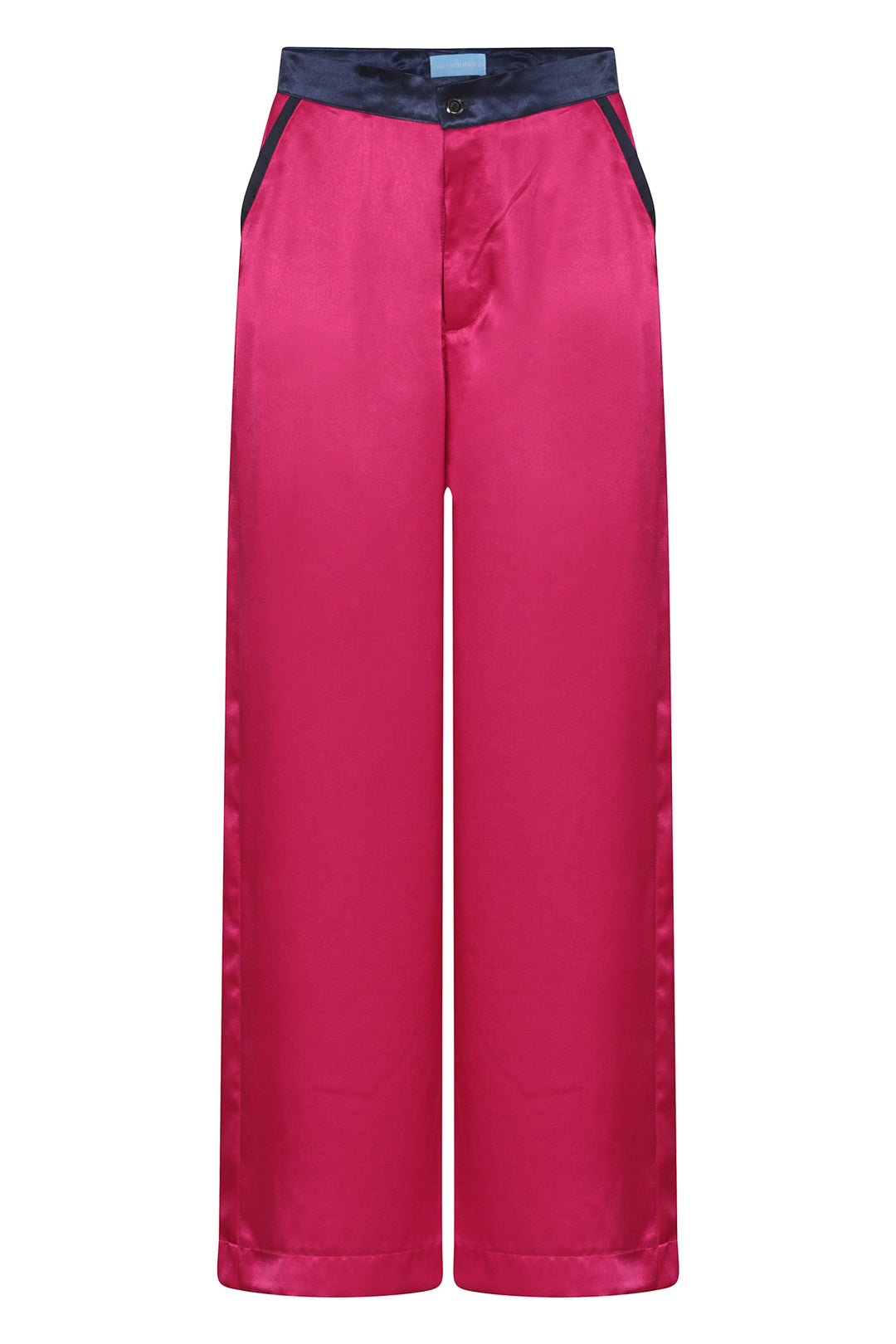 dark pink wide-leg silk trousers with navy trims, worn in London